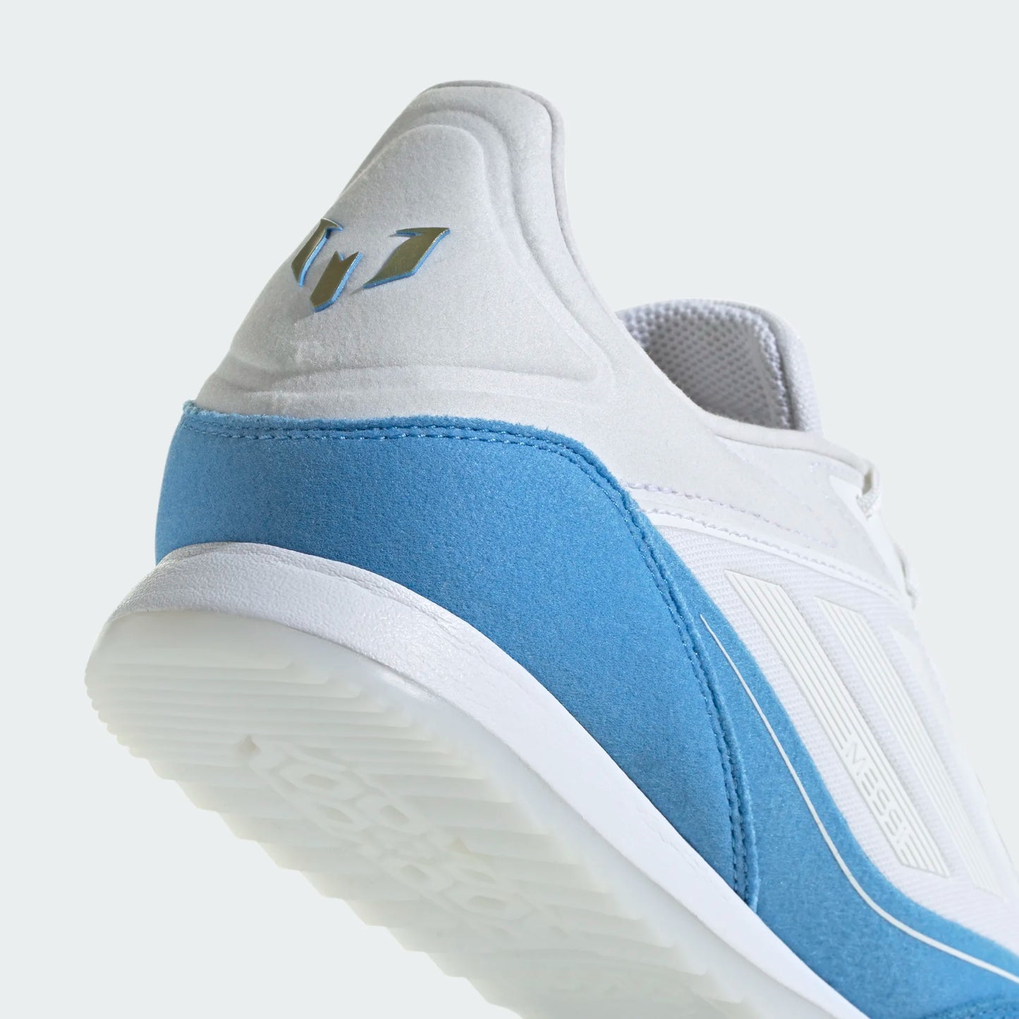 F50 FREESTYLE 24 MESSI FTWWHT/GOLDMT/BLUBRS