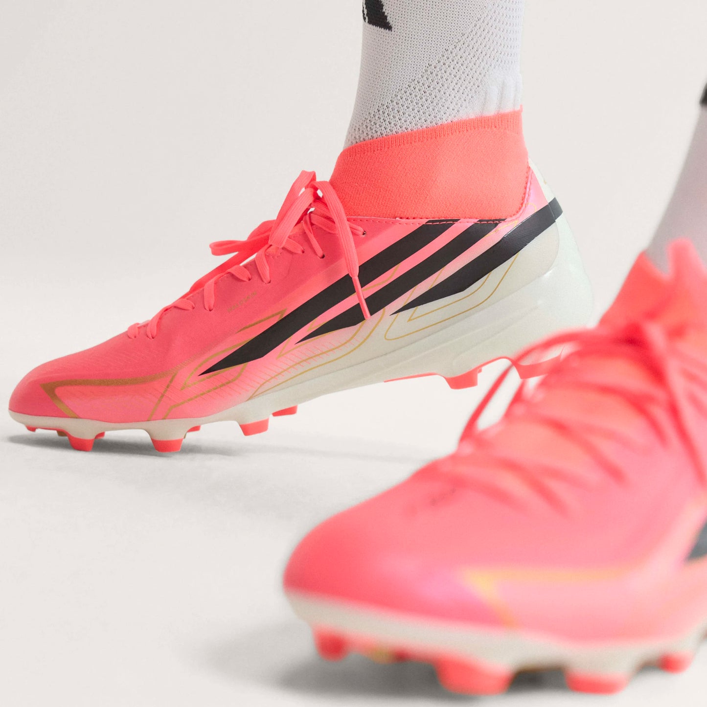 F50 Hyperfast League Mid Firm Ground Men's Soccer Cleats